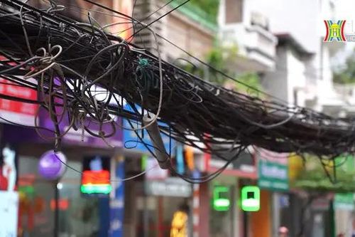 Dây cáp điện làm xấu cảnh quan tuyến phố Nguyễn Ngọc Nại