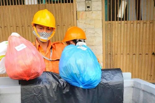 Quận 7 triển khai thí điểm thu phí thu gom rác qua phần mềm