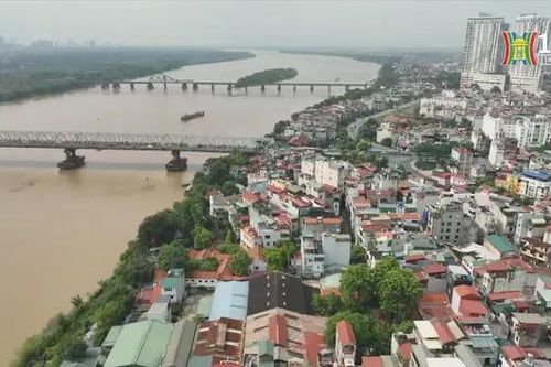 Hà Nội giải tỏa bãi chứa VLXD trái phép ven sông