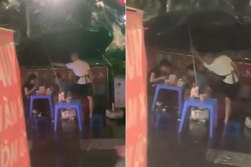 Clip thanh niên che ô cho khách ngồi ăn giữa trời mưa 'gây bão' mạng