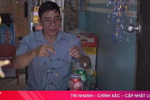 Người đàn ông 'biến' vỏ lon thành lồng đèn độc đáo