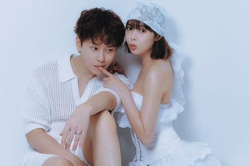 Ảnh cưới của HyunA và chồng bị phản đối, công ty tuyên bố khởi kiện