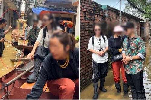 Vợ chồng Ưng Hoàng Phúc và Quế Vân bị chỉ trích 'làm màu' khi đi thuyền cứu trợ ở... Hà Nội