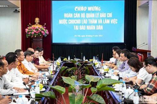 Báo Nhân Dân tiếp đoàn cán bộ quản lý báo chí nước Cộng hòa Dân chủ Nhân dân Lào