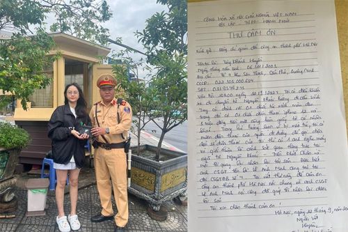 Cảnh sát giao thông nhanh chóng tìm được chủ nhân chiếc túi xách bị rơi trên đường