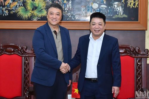 Tăng cường hợp tác giữa Báo Nhân Dân và Tân Hoa xã
