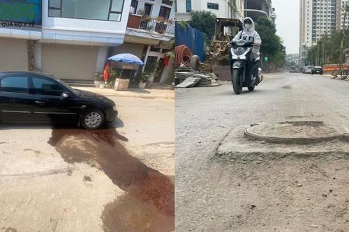 Người dân khốn khổ khi lưu thông qua đoạn đường đang thi công ở Hà Nội