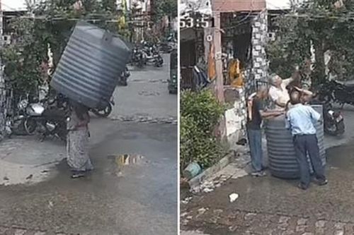 Vừa góp tiền công đức thì bị bồn nước rơi trúng, người phụ nữ chẳng hề hấn gì