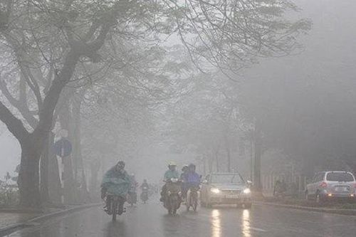 Sương mù dày đặc bao phủ Hà Nội