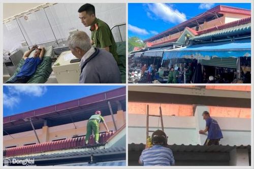 Xin tiền cha không được, một người leo lên mái chợ Tân Phú 'quậy'