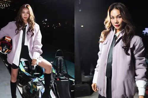 Thanh Hằng lái xe đua công thức 1 trên sàn catwalk