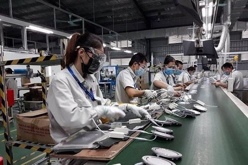 Tháng 11 sản xuất tăng chậm vì cầu thế giới giảm