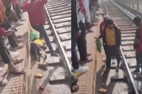 Clip: Giây phút rụng tim chứng kiến cảnh người đàn ông ngã xuống đường ray khi tàu hỏa đi qua