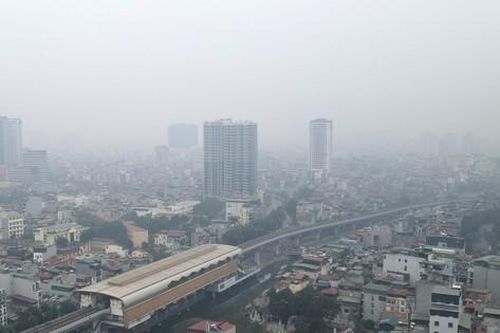 Hơn 10 giờ sáng, Hà Nội vẫn chìm trong sương mù dày đặc