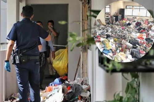 Ngửi thấy mùi hôi thối bốc ra từ căn hộ đầy rác, hàng xóm sững sờ khi biết sự thật