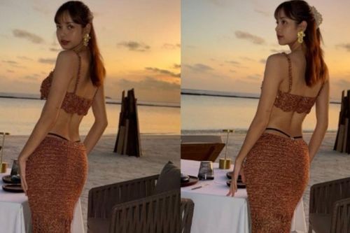 Chiếc váy 'táo bạo' tôn lên vóc dáng đồng hồ cát của Lisa Blackpink đang gây sốt