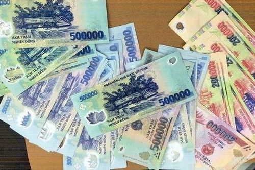 Cảnh giác với tiền giả trong dịp Tết
