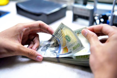 Đồng USD lao dốc sau tín hiệu mới về thuế quan của Mỹ