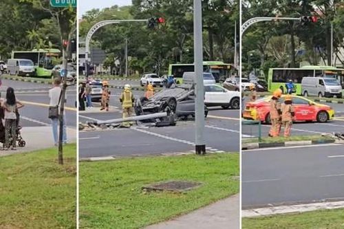 Ô tô lật ngược, húc đổ đèn giao thông, tài xế có phản ứng 'lạ'