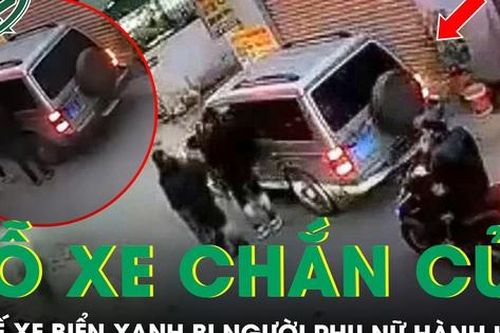 Tài xế xe biển xanh bị người phụ nữ chửi bới, hành hung vì đỗ xe chắn cửa