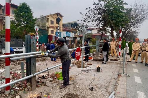 Xóa bỏ lối đi tự mở qua đường sắt