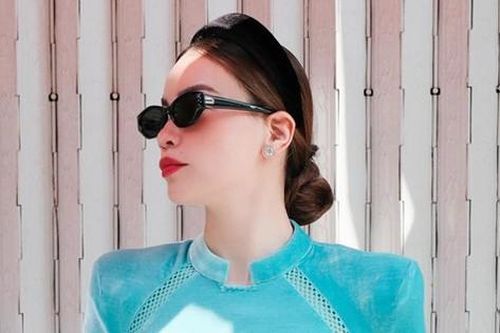 Ca sĩ Hồ Ngọc Hà hóa 'mợ chảnh' diện áo dài, xách túi nửa tỷ đồng du xuân