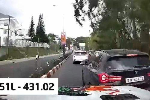 Tài xế BMW 51L - 431.02 ngang nhiên tạt đầu xe khác