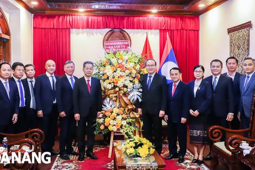 Bí thư Thành ủy Nguyễn Văn Quảng chúc mừng 70 năm ngày thành lập Đảng Nhân dân Cách mạng Lào