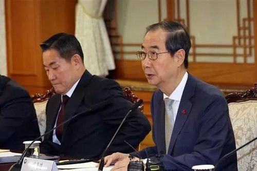 Thủ tướng Hàn Quốc Han Duck Soo được phục chức