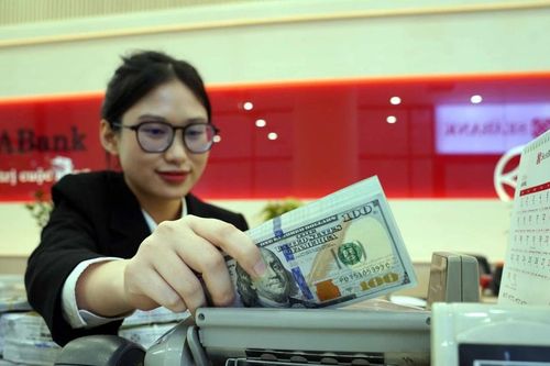 Standard Chartered điều chỉnh dự báo tỷ giá lên 26.000 đồng