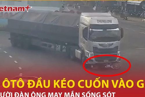 Bị ôtô đầu kéo cuốn vào gầm, người đàn ông may mắn sống sót