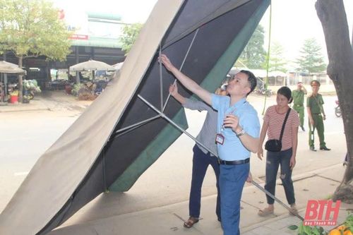 Lập lại trật tự hành lang an toàn giao thông Quốc lộ 45 qua thị trấn Kim Tân