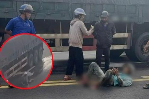 Người đàn ông thoát chết sau cú va chạm, bị xe tải cuốn vào gầm
