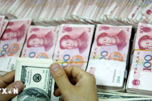 Trung Quốc điều chỉnh tỷ giá phản ánh đà suy yếu của đồng USD