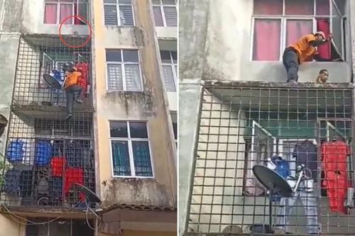 Nghẹt thở khoảnh khắc người đàn ông liều mình leo 4 tầng nhà cứu bé trai kẹt trên bệ cửa sổ