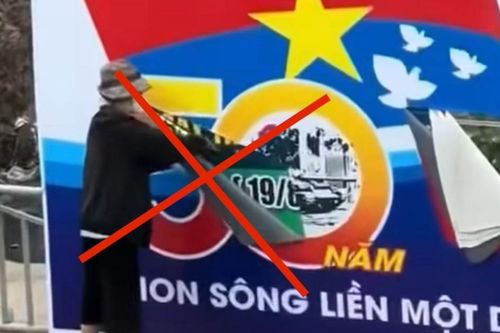 Người phụ nữ phá hoại banner chào mừng đại lễ 30/4 có dấu hiệu tâm thần