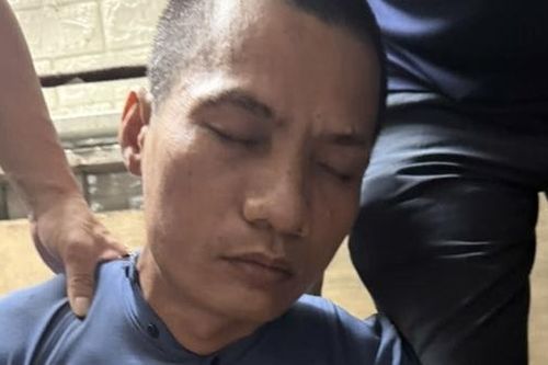 Đối tượng cướp ngân hàng ở Chương Mỹ bị bắt khi đang ẩn náu ở lán trại ngoài đê Sông Hồng