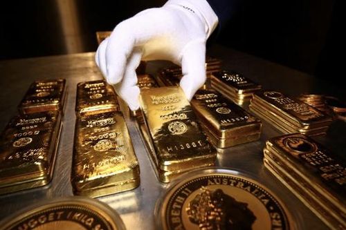 Giá vàng tăng vì đồng USD quay đầu giảm, SPDR Gold Trust bán ròng hơn 6 tấn vàng tuần này