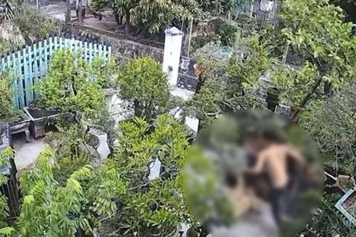 Xác minh clip chồng đánh vợ gục trong sân vườn mặc hàng xóm can ngăn