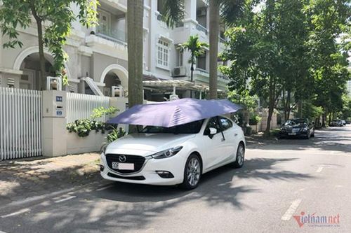 Muôn kiểu chống nắng nóng như đổ lửa cho 'xế cưng' của cánh tài xế