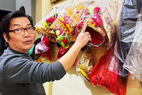 Lửa hát ca còn sáng trên sắc áo