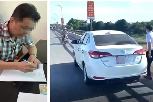 Dừng xe trên cầu thả đồ xuống sông, tài xế ô tô bị phạt 13,5 triệu đồng