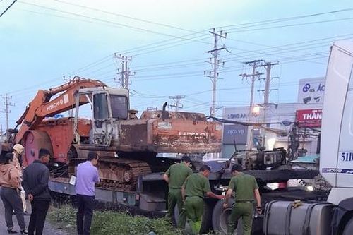 Long An: Tự té trên QL1, hai người đi xe máy bị xe container cán tử vong