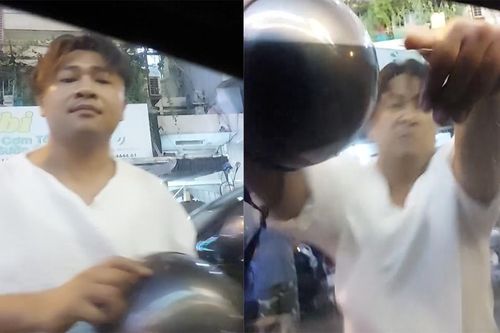 Người đàn ông chở 2 trẻ em, chặn đầu xe taxi đập phá
