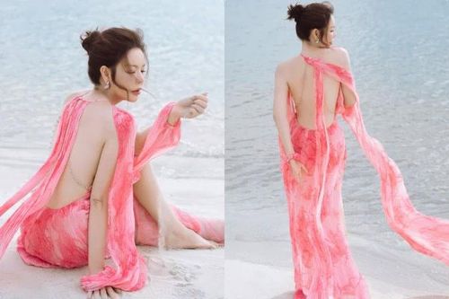 'Phú bà' Lý Nhã Kỳ gợi cảm với đầm xẻ cao, hở trọn tấm lưng