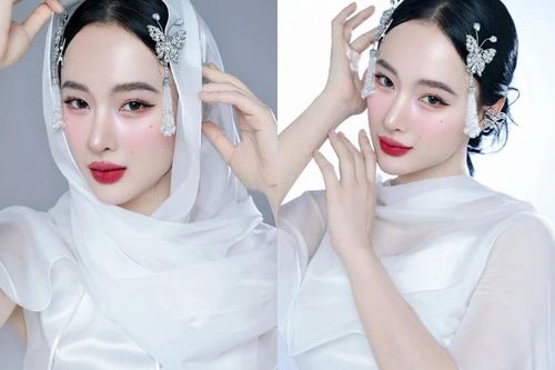 'Mỹ nhân cơ bắp' Angela Phương Trinh 'quay xe' đầy nữ tính