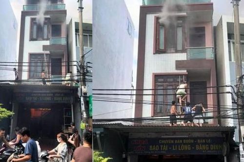 Người dân trèo tường cứu 4 người trong đám cháy