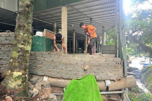 Chủ công trình không phép trên đèo Bảo Lộc đang tự nguyện tháo dỡ khắc phục vi phạm