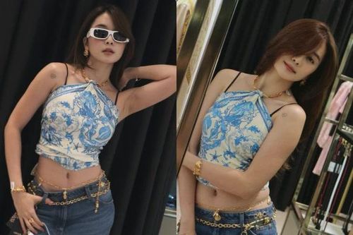 Chị gái Thiều Bảo Trâm dùng khăn làm áo, khoe dáng gợi cảm