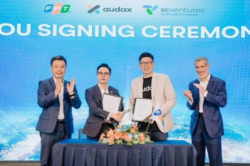FPT và công ty do Standard Chartered đầu tư ký hợp tác quy mô 100 triệu USD trong 3 năm